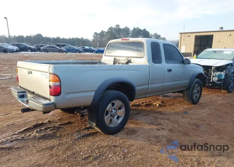 2001 Toyota Tacoma из США, поврежденный, VIN 5TEWM72NX1Z763578